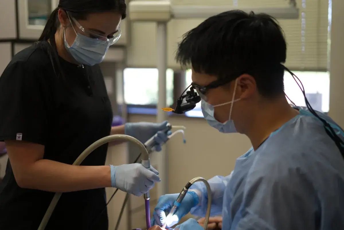 Dr. Henry Kim performing a dental procedure at My Bloomingdale Dentist in Bloomingdale, IL